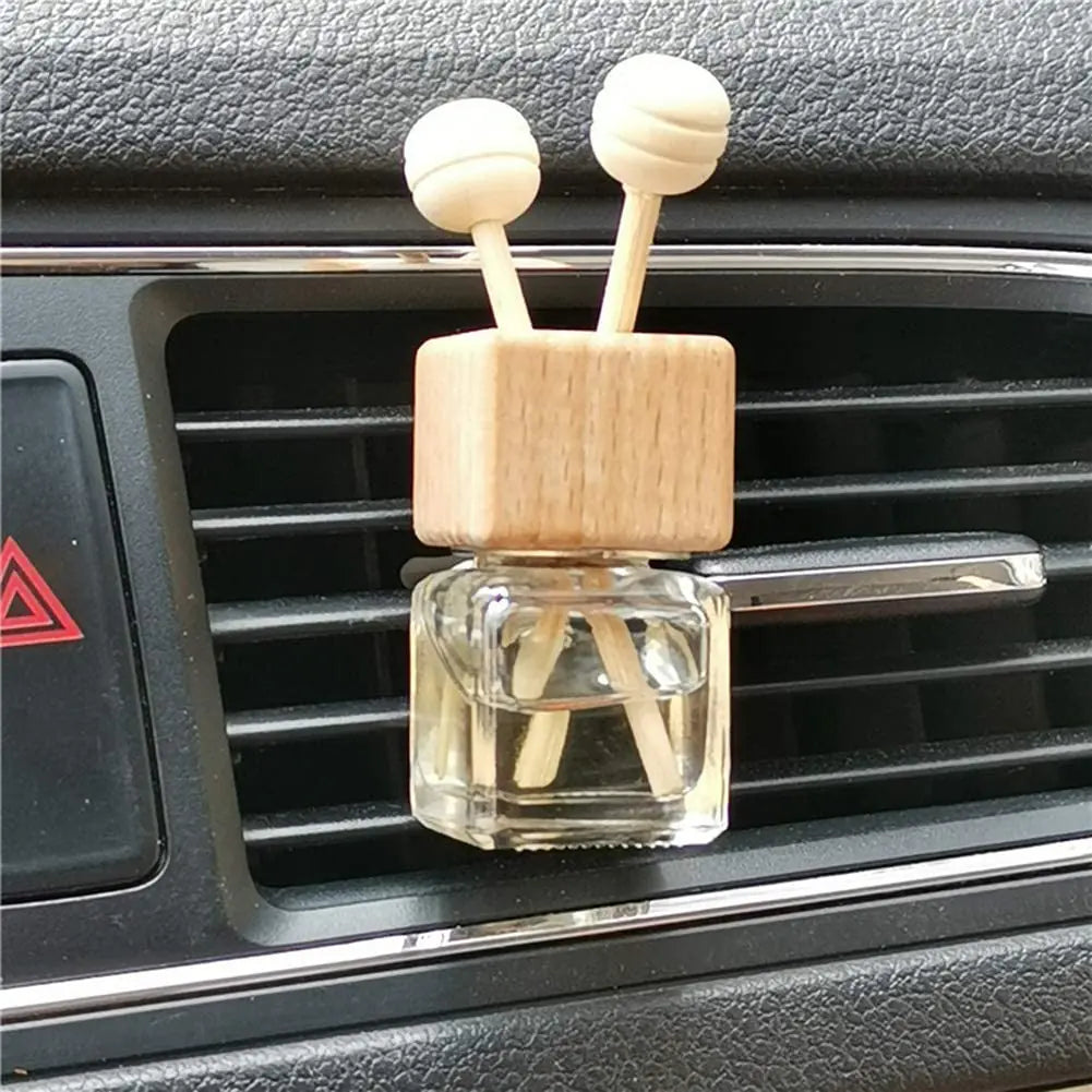 Clip para botella de perfume de coche